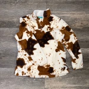 Gorgeous cow pattern quarter zip sweater.